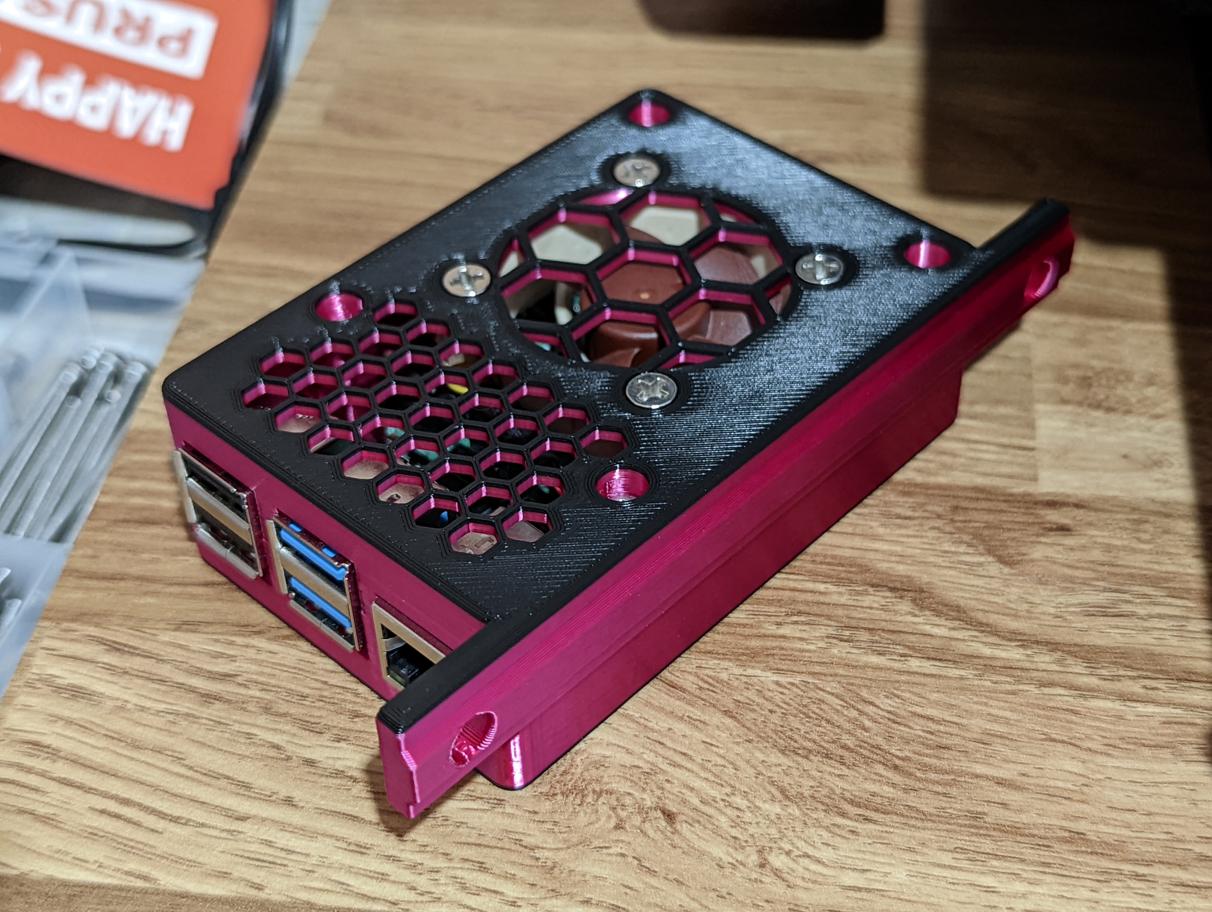 Custom 3D printed Raspberry Pi case in black and pink