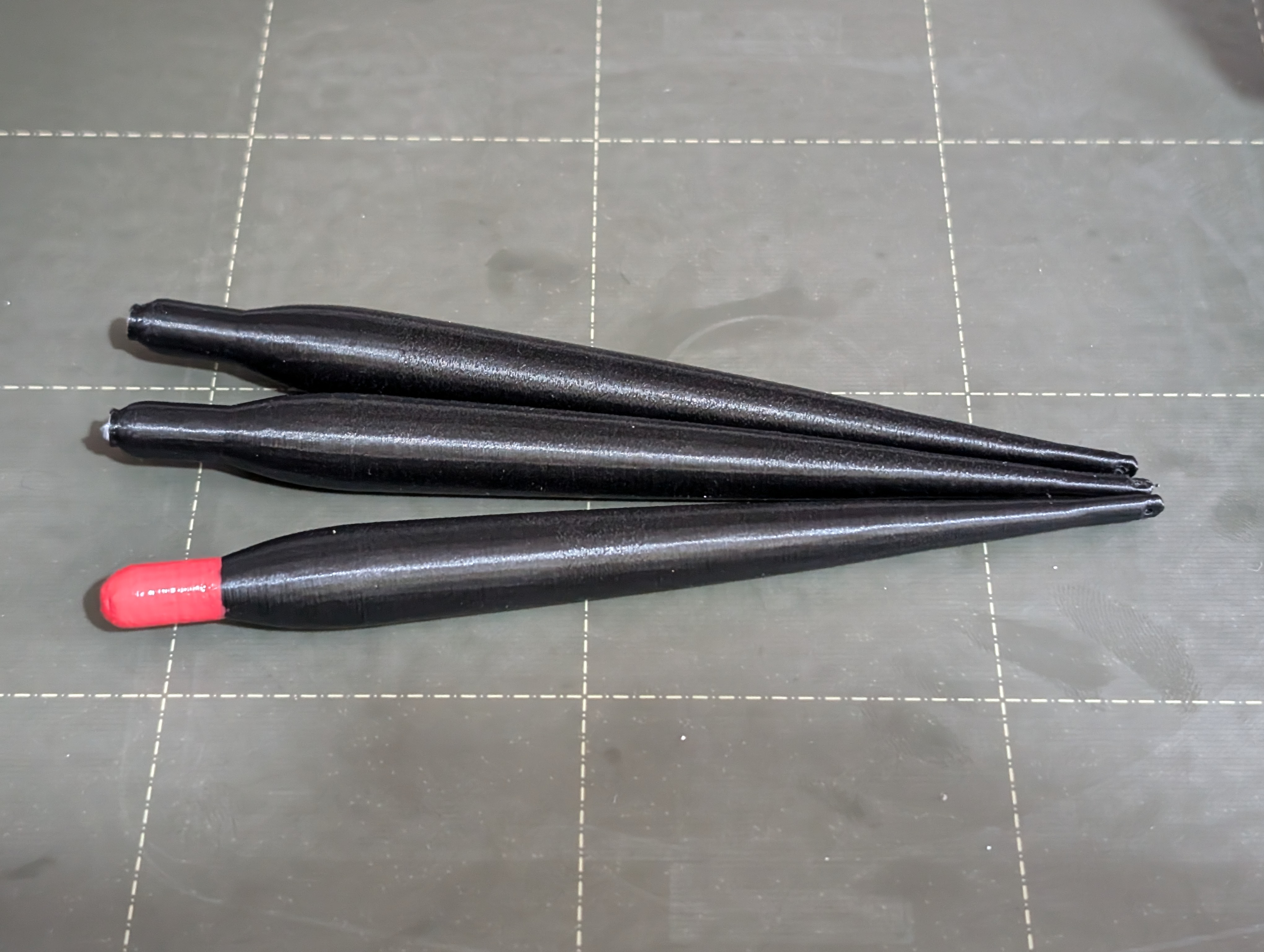 3D printed fishing floats in black